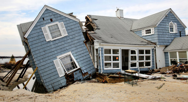 A home knocked off the foundation by Hurricane Sandy as clean up continues in the aftermath January 16, 2013 in Mantoloking, NJ.