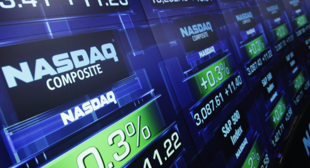 FILE - In this Tuesday, Aug. 21, 2012, file photo, stock prices are shown at the Nasdaq MarketSite, in New York. Trading was halted in Nasdaq-listed securities on Thursday, Aug. 22, 2013, because of a technical problem. The exchange sent out an alert to traders at 12:20 p.m. EDT saying that trading was being halted until further notice because of problems with a quote dissemination system. (AP Photo/Mark Lennihan, File)